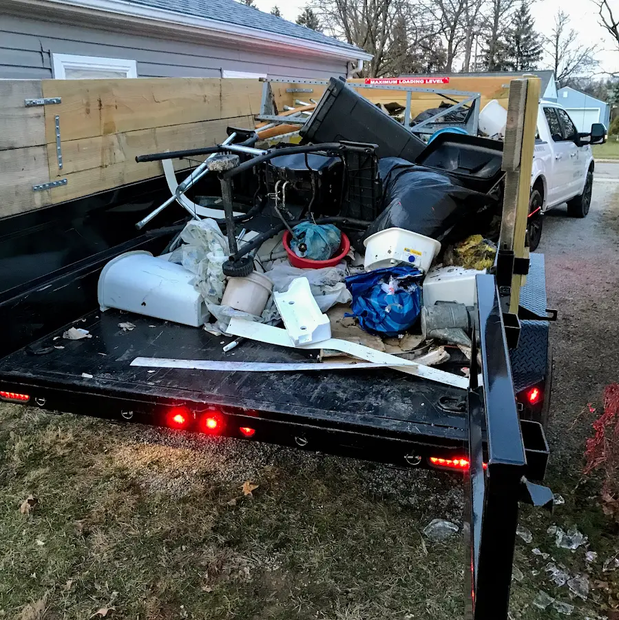 Roll-off dumpster delivered to a residential driveway in Fort Collins